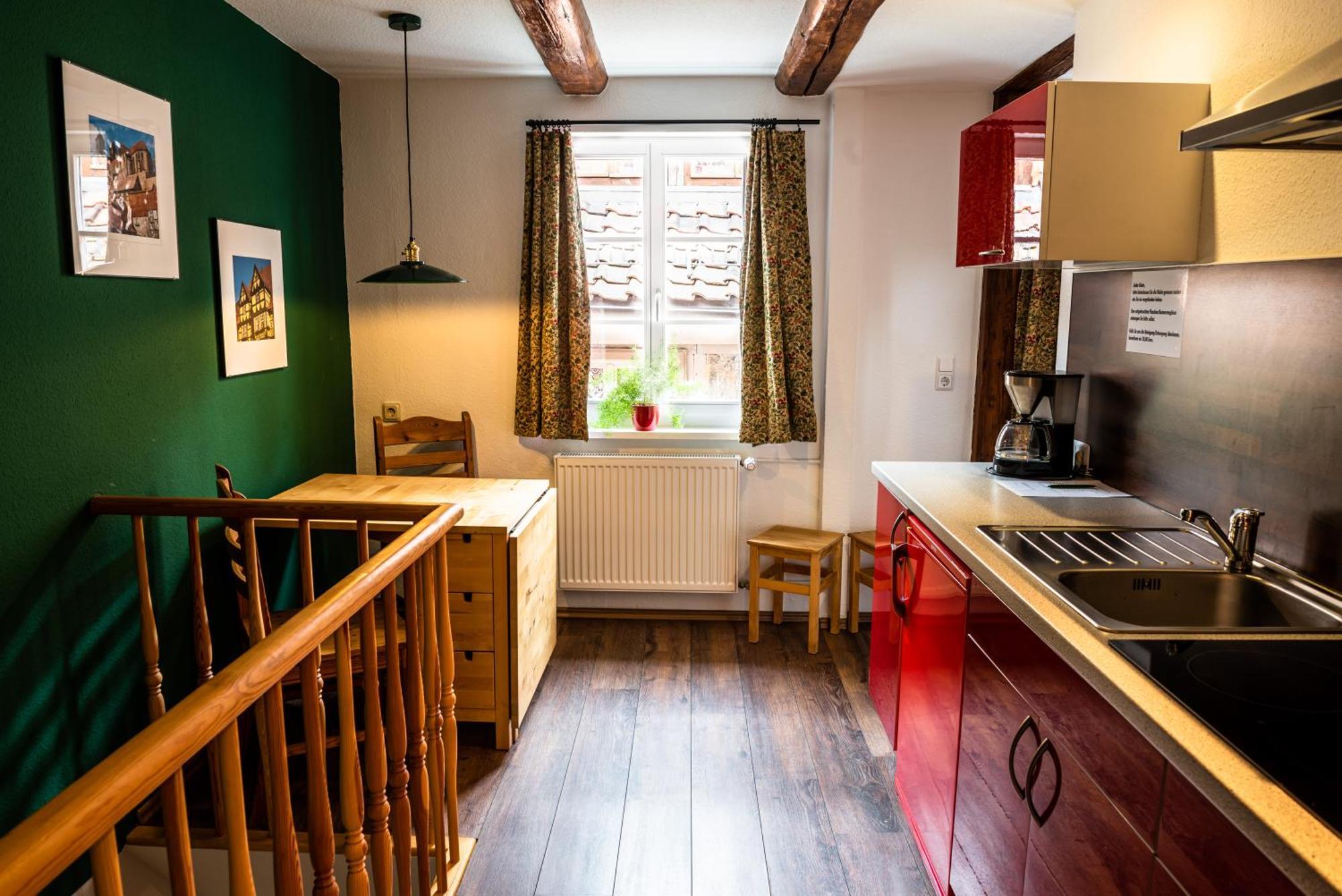 Fachwerkhotel - Ferienhaeuser Vorhof Zur Hoelle クヴェードリンブルク エクステリア 写真