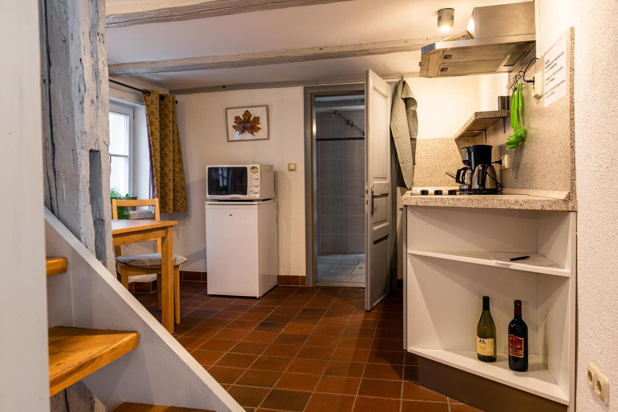 Fachwerkhotel - Ferienhaeuser Vorhof Zur Hoelle クヴェードリンブルク エクステリア 写真